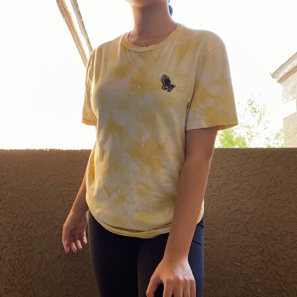 Yellow bleached praying graphic t-shirt